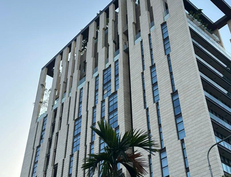 H&CO Tower in Douala, Cameroon, with a vertical facade pattern